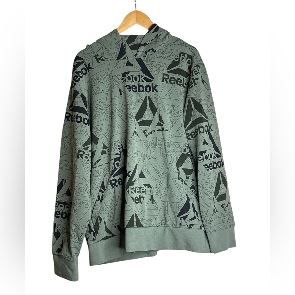 Reebok green pullover hoodie allover logo and vector graphic print. Size XL